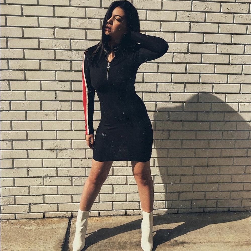 Black long sleeve dress with red stripe detail